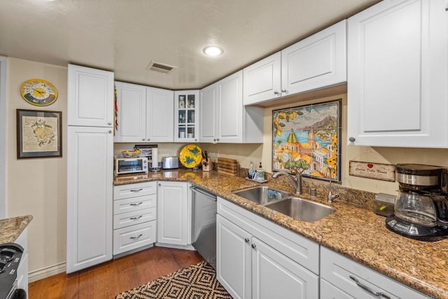 2564 Navarra Dr Unit 113, Carlsbad, CA 92009 - kitchen featuring a sink, stainless steel dishwasher, white cabinetry, glass insert cabinets, and recessed lighting