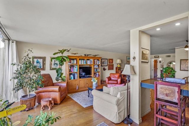 2564 Navarra Dr Unit 113, Carlsbad, CA 92009 - living area featuring recessed lighting, wood finished floors, and a ceiling fan