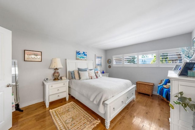 2564 Navarra Dr Unit 113, Carlsbad, CA 92009 - bedroom featuring light wood finished floors and baseboards