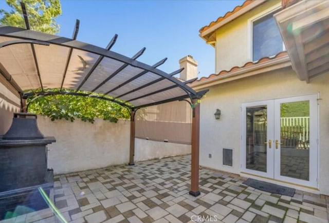 49 El Cencerro, Rancho Santa Margarita, CA 92688 - view of patio / terrace with a pergola and french doors