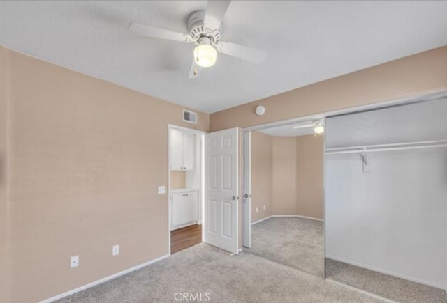 49 El Cencerro, Rancho Santa Margarita, CA 92688 - unfurnished bedroom with a ceiling fan, visible vents, carpet floors, baseboards, and a closet