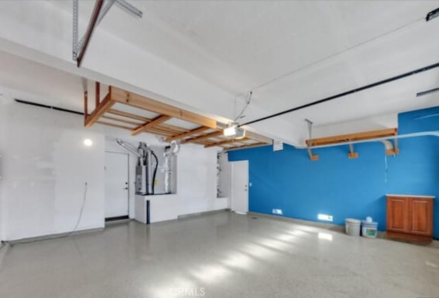 49 El Cencerro, Rancho Santa Margarita, CA 92688 - garage featuring a garage door opener and heating unit