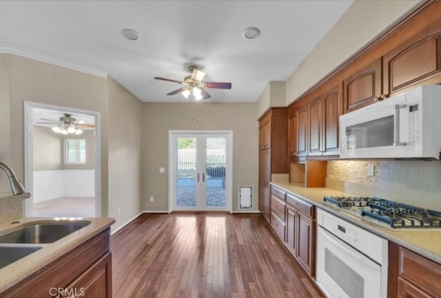 49 El Cencerro, Rancho Santa Margarita, CA 92688 - kitchen featuring white appliances, a ceiling fan, and a wealth of natural light