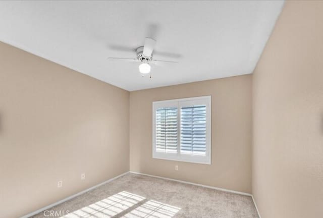 49 El Cencerro, Rancho Santa Margarita, CA 92688 - spare room featuring baseboards, ceiling fan, and light colored carpet