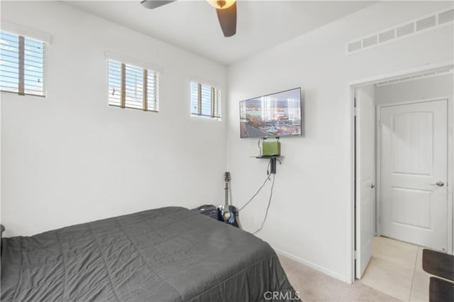 4250 W 5th St, Santa Ana, CA 92703 - bedroom with baseboards, a ceiling fan, visible vents, and light carpet