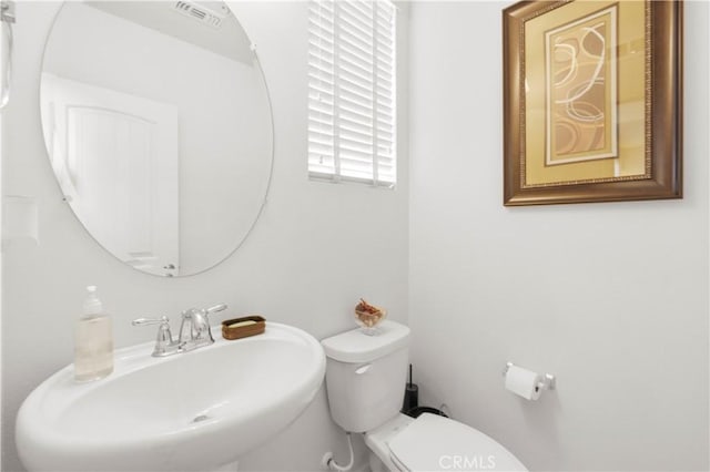 4250 W 5th St, Santa Ana, CA 92703 - half bath with visible vents, a sink, and toilet
