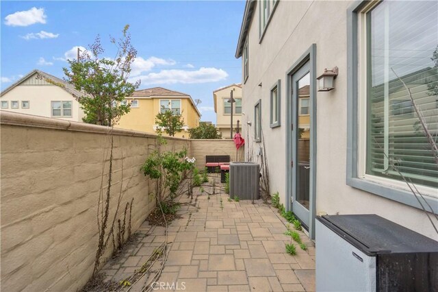 4250 W 5th St, Santa Ana, CA 92703 - view of patio with a fenced backyard and cooling unit
