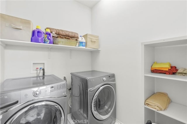 4250 W 5th St, Santa Ana, CA 92703 - washroom with washer and dryer and laundry area