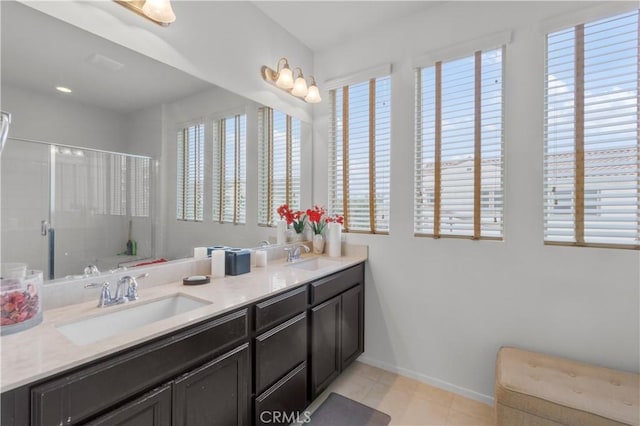 4250 W 5th St, Santa Ana, CA 92703 - bathroom featuring a wealth of natural light, a sink, and a shower with shower door