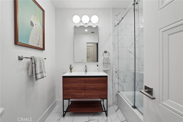 bathroom featuring baseboards, combined bath / shower with glass door, marble finish floor, and vanity