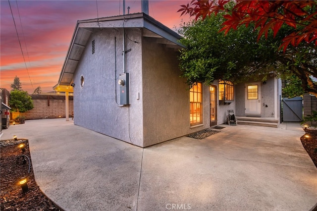 exterior space with a gate and fence