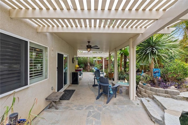 view of patio featuring fence, a pergola, and ceiling fan