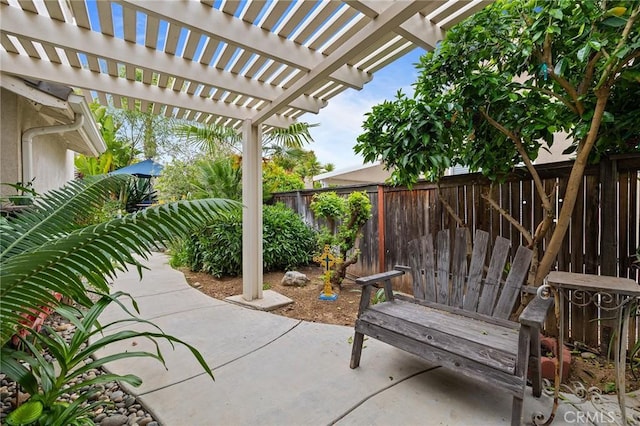 view of patio / terrace featuring a fenced backyard and a pergola