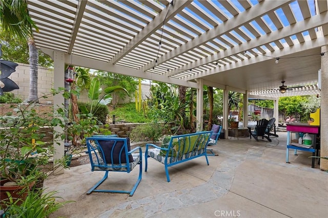 view of patio / terrace with outdoor dining area, a fenced backyard, a ceiling fan, and a pergola