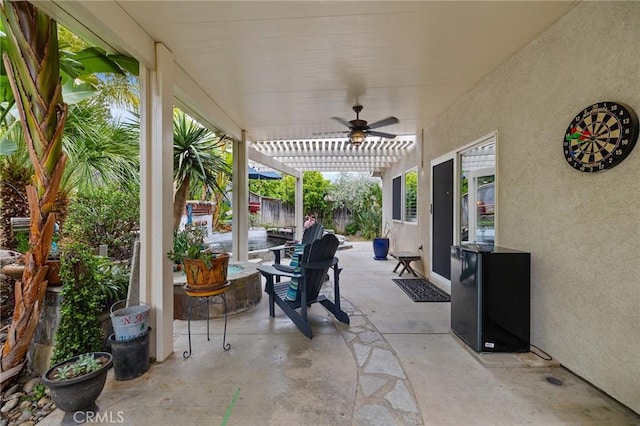 view of patio / terrace with a fenced backyard and ceiling fan