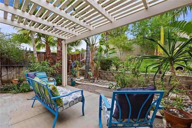 view of patio featuring a fenced backyard and a pergola
