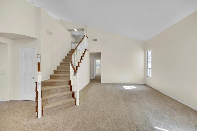 6017 Piros Way, Oceanside, CA 92056 - stairs featuring carpet floors, a wealth of natural light, and high vaulted ceiling