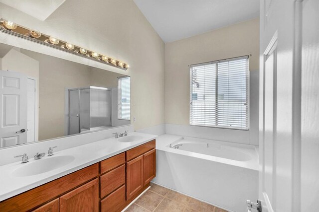6017 Piros Way, Oceanside, CA 92056 - full bath with double vanity, tile patterned floors, a sink, and a garden tub