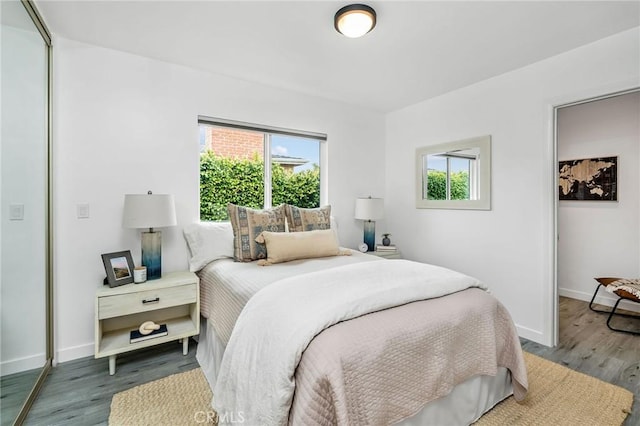 4301 W 138th St, Hawthorne, CA 90250 - bedroom featuring wood finished floors and baseboards