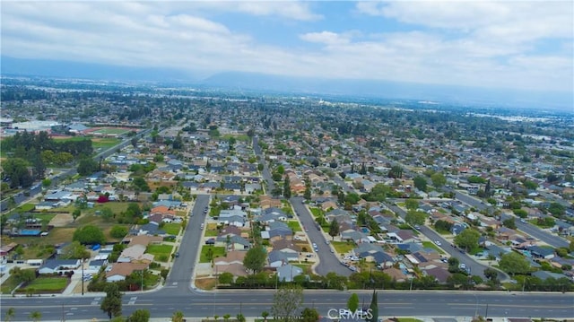 birds eye view of property with a residential view