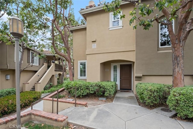 exterior space featuring stairway