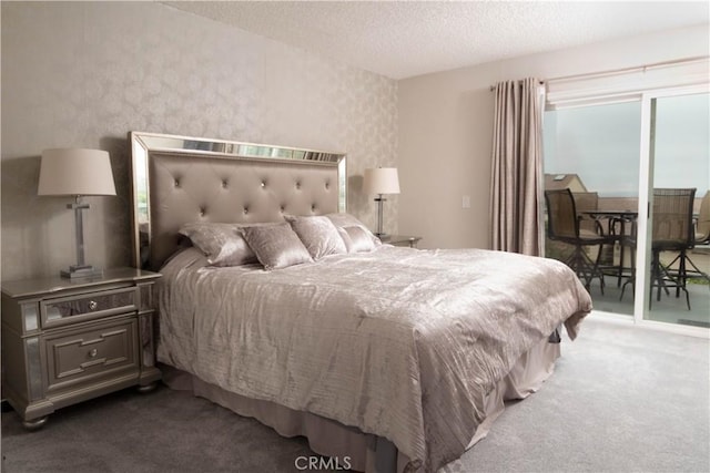 33601 Via Corvalian Unit 4, Dana Point, CA 92629 - carpeted bedroom with access to outside and a textured ceiling