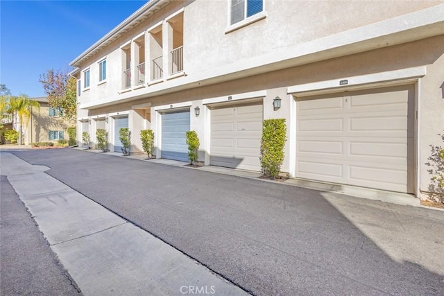 exterior space with a garage