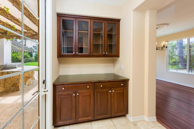 5018 Via Andrea, Newbury Park, CA 91320 - bar featuring baseboards and a chandelier