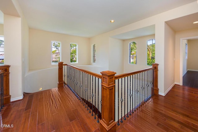 5018 Via Andrea, Newbury Park, CA 91320 - hall with a healthy amount of sunlight, hardwood / wood-style floors, and an upstairs landing