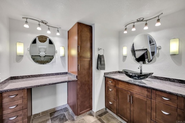 6755 Caminito Del Greco, San Diego, CA 92120 - full bath featuring track lighting, vanity, a textured ceiling, and baseboards