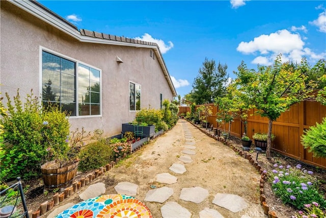 view of yard featuring a fenced backyard