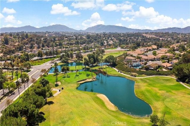 bird's eye view featuring a residential view, view of golf course, and a water and mountain view