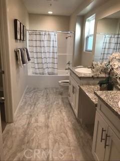 8621 Noble Ave Unit 4, North Hills, CA 91343 - full bath with vanity, toilet, and shower / tub combo with curtain