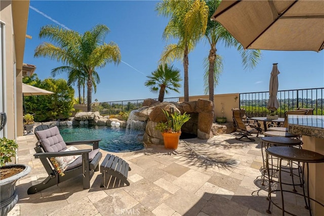 12 Santa Barbara Pl, Laguna Niguel, CA 92677 - view of patio featuring outdoor dry bar, a fenced in pool, and a fenced backyard