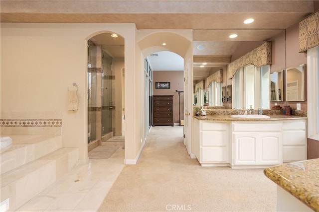 12 Santa Barbara Pl, Laguna Niguel, CA 92677 - bathroom featuring a garden tub, recessed lighting, vanity, and a stall shower