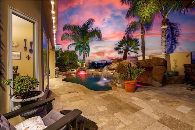 12 Santa Barbara Pl, Laguna Niguel, CA 92677 - pool at dusk with a patio area