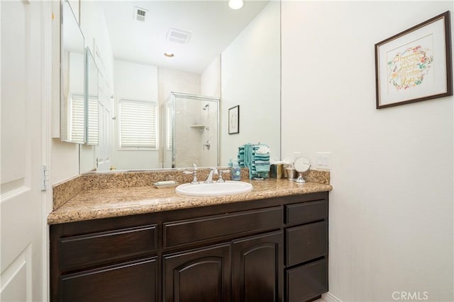 12 Santa Barbara Pl, Laguna Niguel, CA 92677 - full bath with visible vents, a stall shower, and vanity