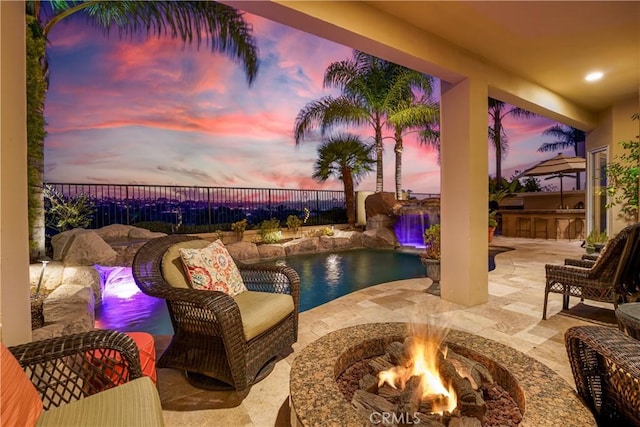 12 Santa Barbara Pl, Laguna Niguel, CA 92677 - view of swimming pool featuring a patio, a fenced in pool, exterior kitchen, a fenced backyard, and a fire pit