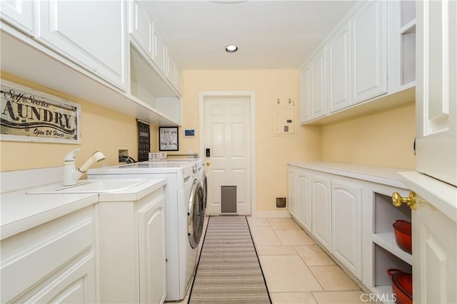 12 Santa Barbara Pl, Laguna Niguel, CA 92677 - laundry room featuring recessed lighting, separate washer and dryer, light tile patterned floors, cabinet space, and baseboards