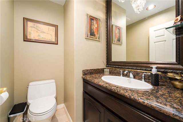 12 Santa Barbara Pl, Laguna Niguel, CA 92677 - bathroom with vanity, toilet, a chandelier, and baseboards