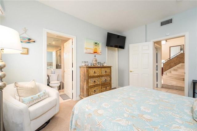 12 Santa Barbara Pl, Laguna Niguel, CA 92677 - bedroom with visible vents, ensuite bath, and light colored carpet