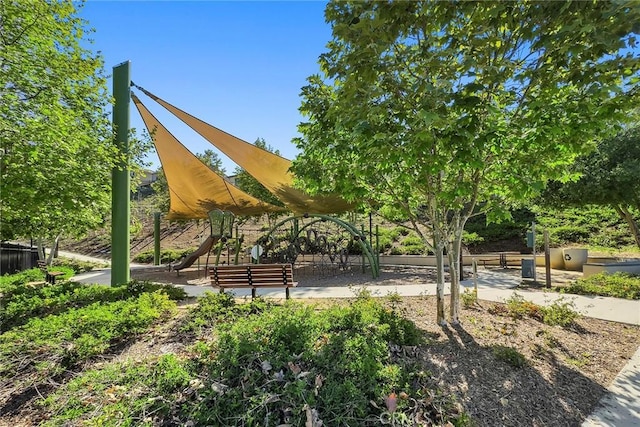 view of community featuring playground community