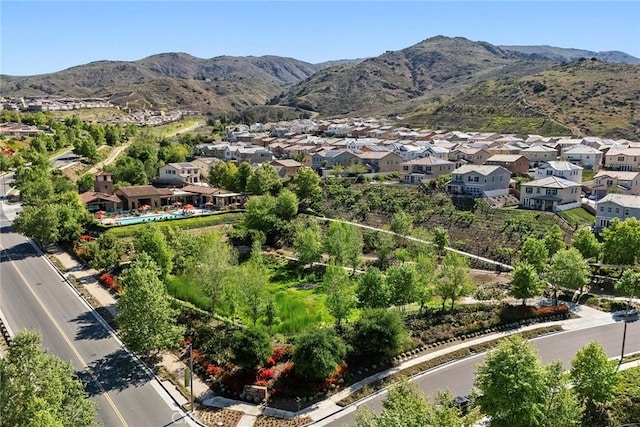 birds eye view of property with a residential view and a mountain view