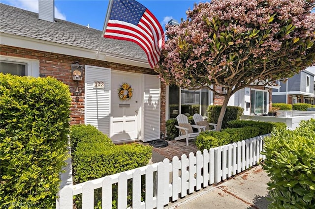133 Morristown Ln, Costa Mesa, CA 92626 - entrance to property with brick siding and a chimney