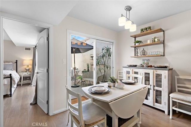 133 Morristown Ln, Costa Mesa, CA 92626 - dining room featuring light wood-style flooring and baseboards