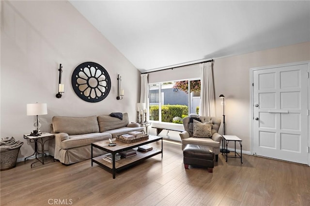 133 Morristown Ln, Costa Mesa, CA 92626 - living room featuring wood finished floors, high vaulted ceiling, and baseboards