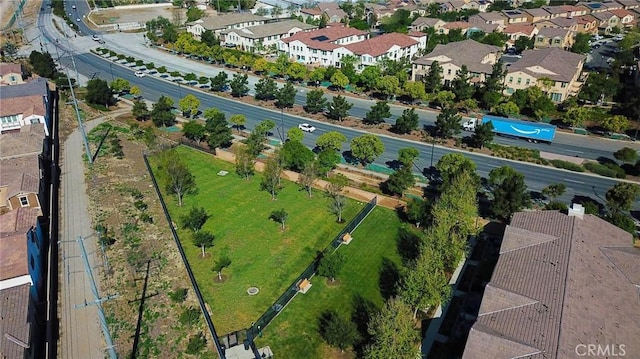 birds eye view of property with a residential view