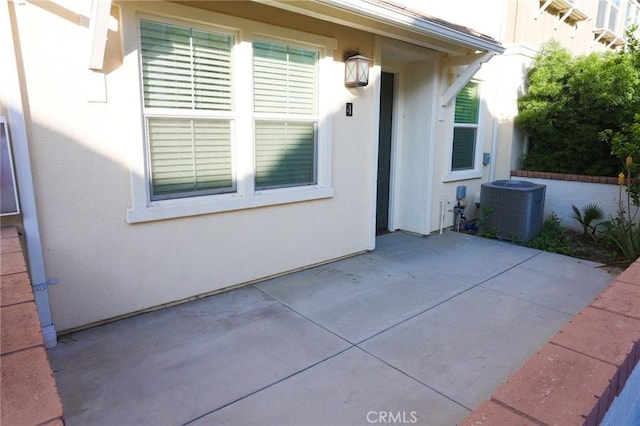view of patio featuring central AC unit
