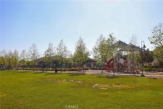 exterior space with a lawn and playground community