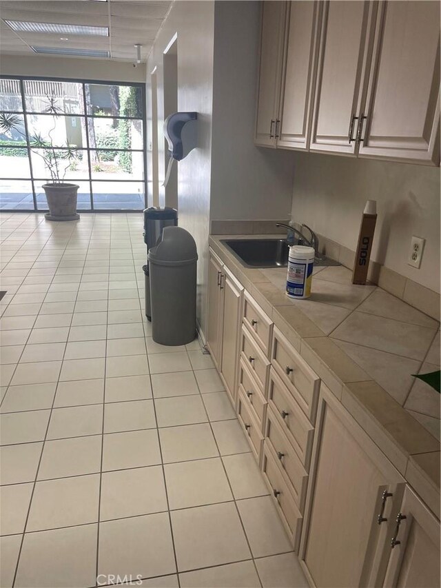 600 W 9th St Unit 902, Los Angeles, CA 90015 - kitchen featuring tile countertops and light tile patterned flooring